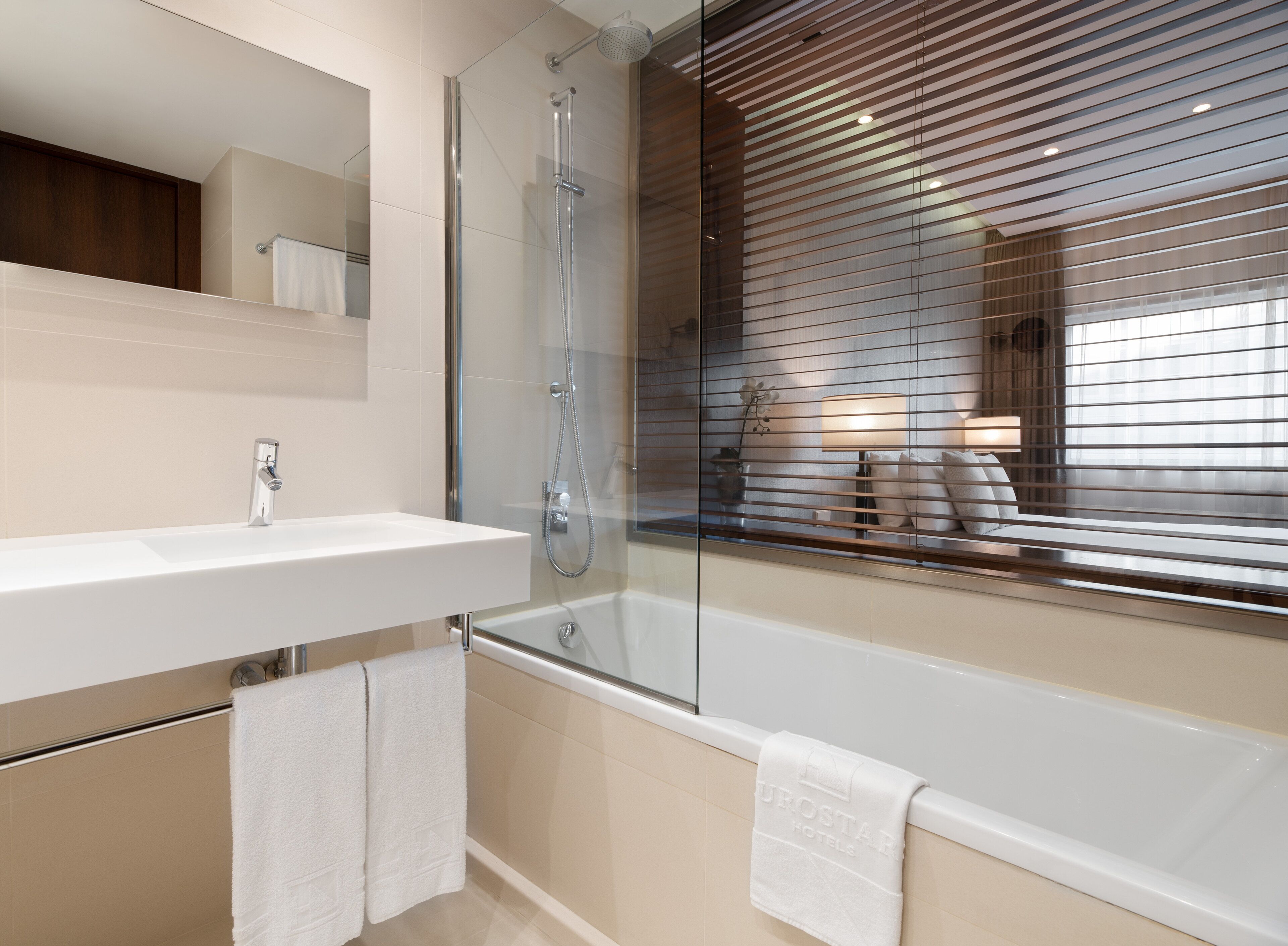 bathtub, deep-soaking bathtub, eco-friendly toiletries, hair dryer