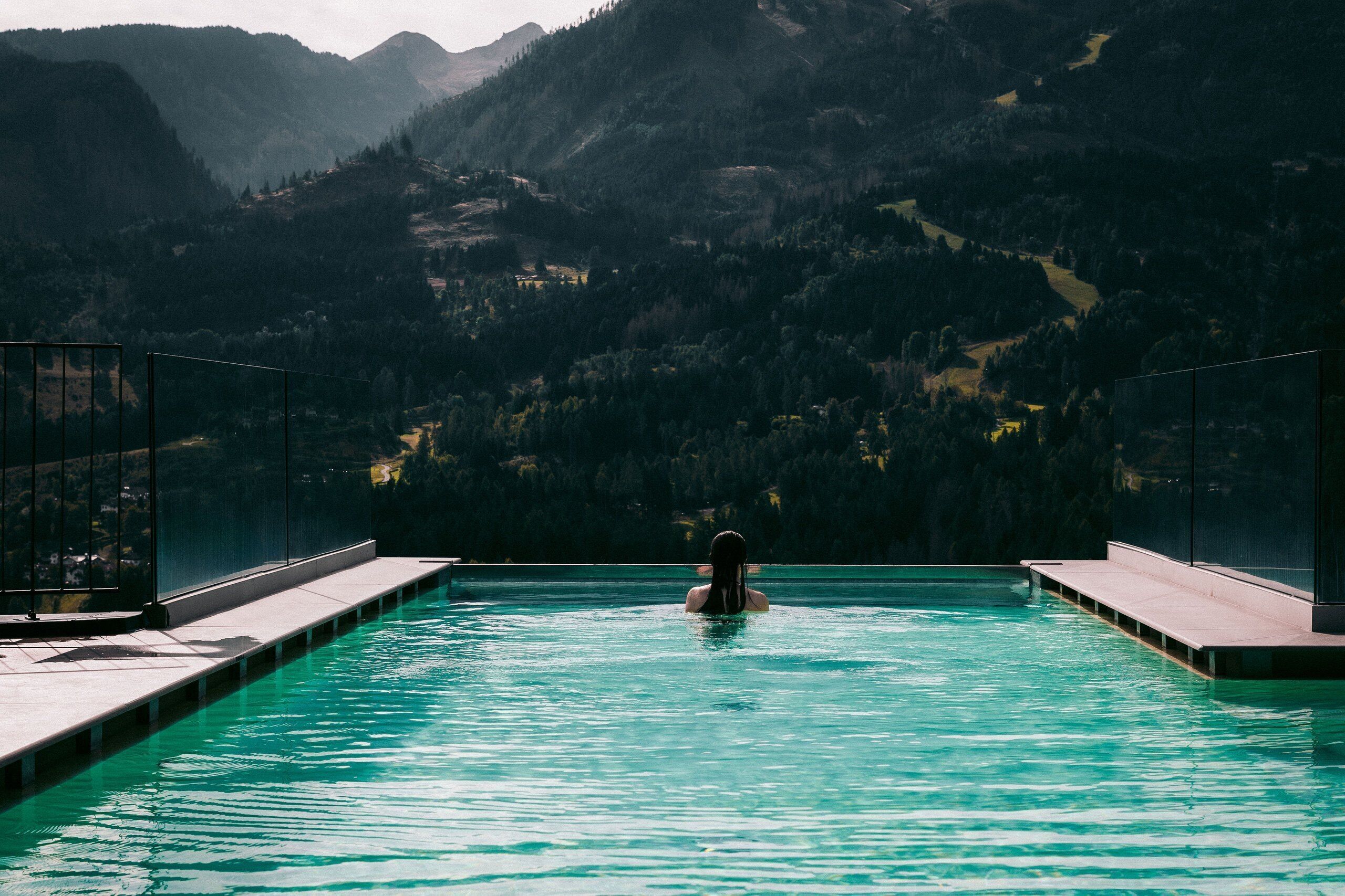 A swimming pool with a view of mountains.
