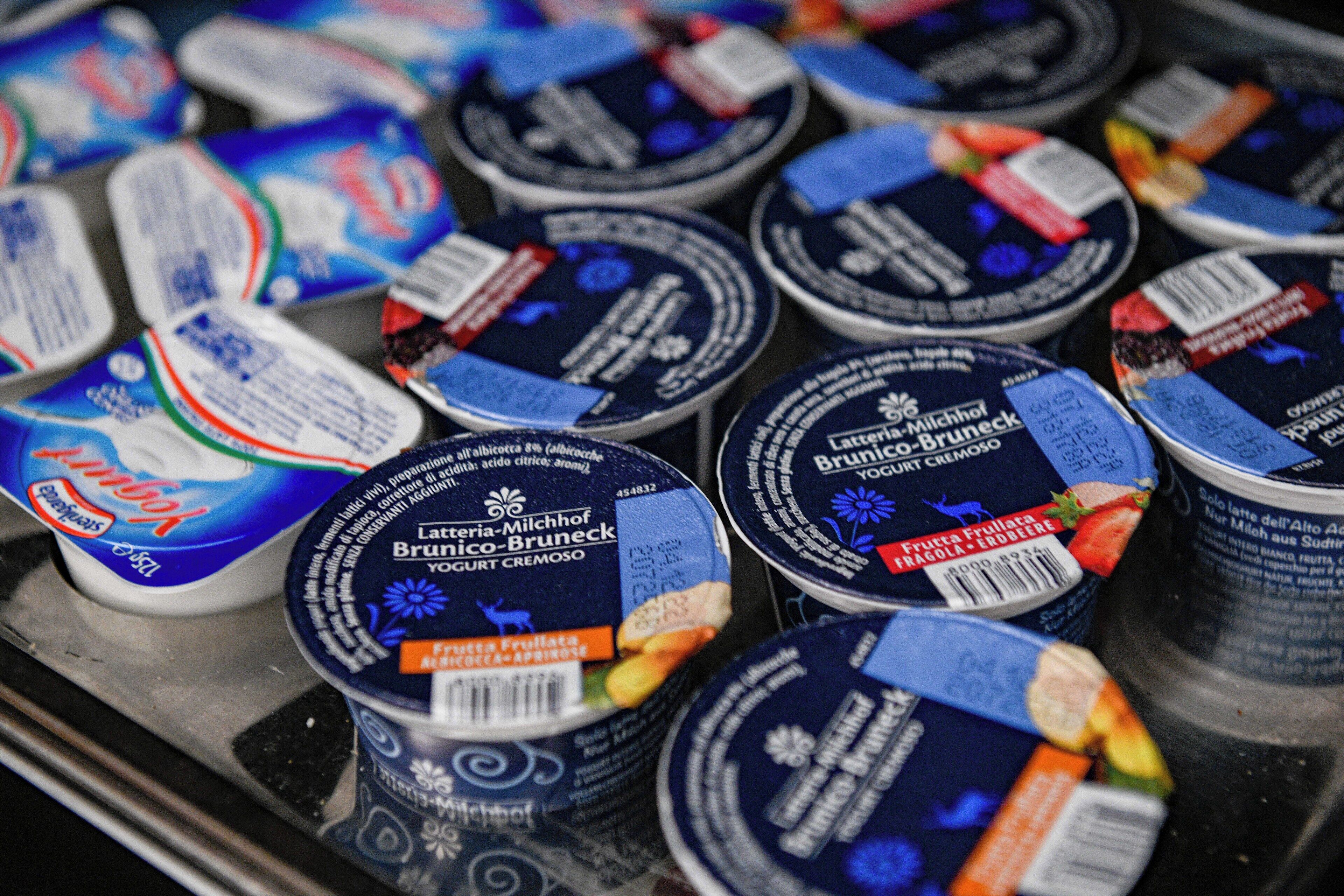 A refrigerated display of Brindisi-Milchhof yogurt products.