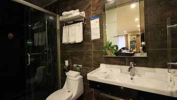 Shower, free toiletries, hair dryer, slippers