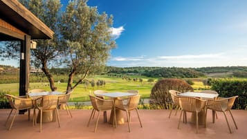 Breakfast, lunch, dinner served; golf course views