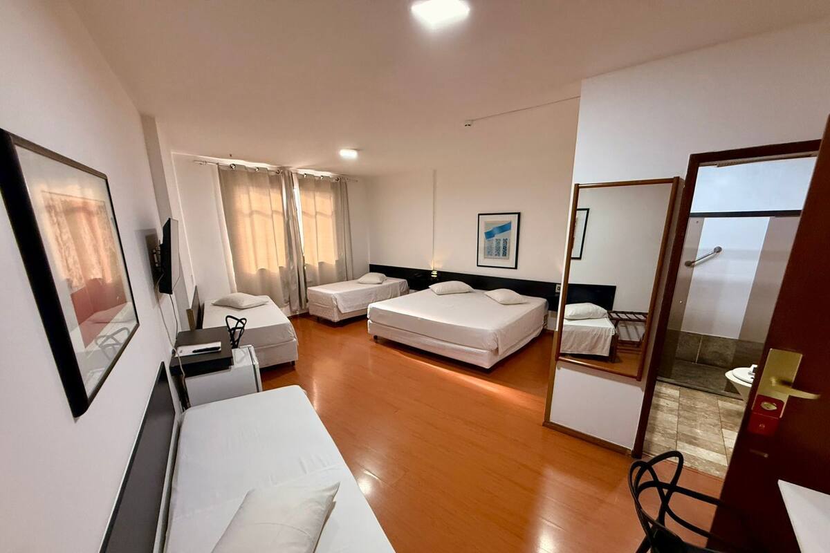 Family Quadruple Room | Minibar, in-room safe, desk, laptop workspace