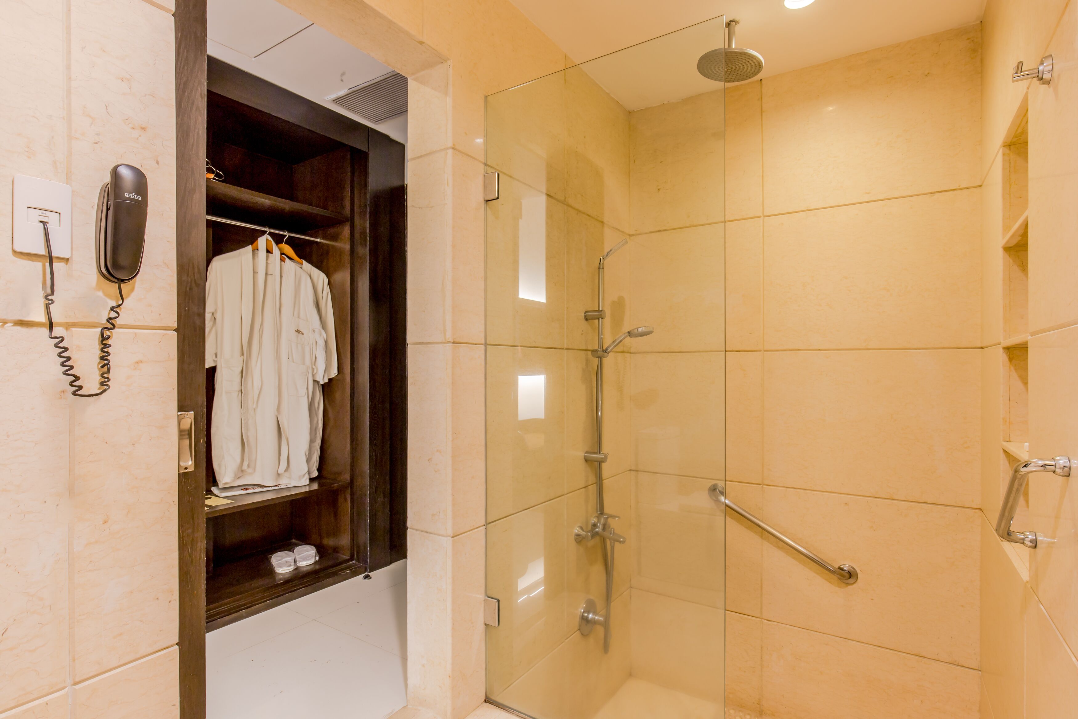 executive room, 1 bedroom, mountain view | bathroom | combined shower/bathtub, rainfall showerhead, designer toiletries