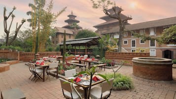 Breakfast, lunch, dinner served; international cuisine, garden views