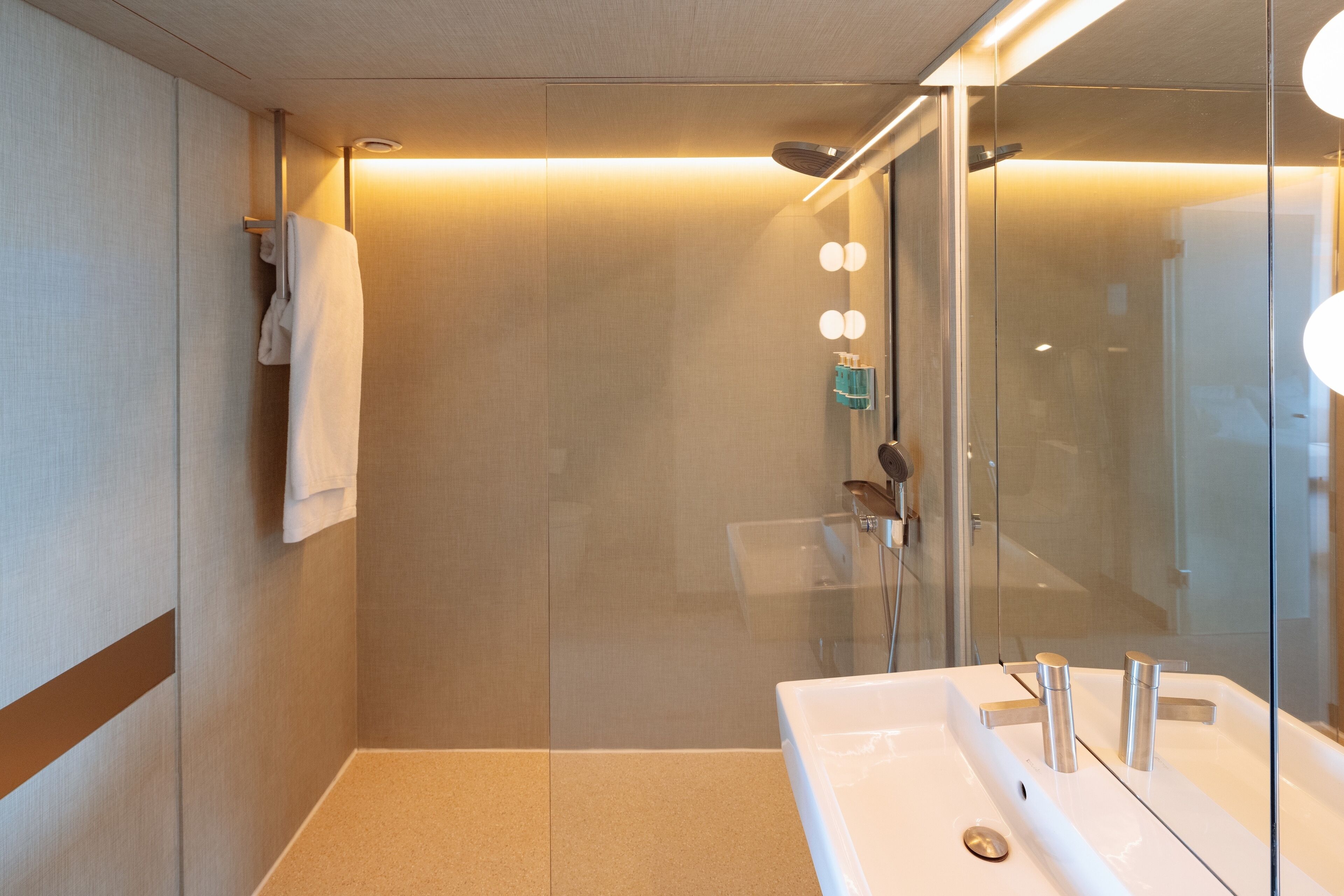 junior suite, balcony | bathroom | shower, rainfall showerhead, designer toiletries, hair dryer