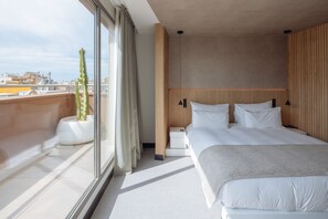 Draps en coton égyptien, couette en duvet d'oie, minibar