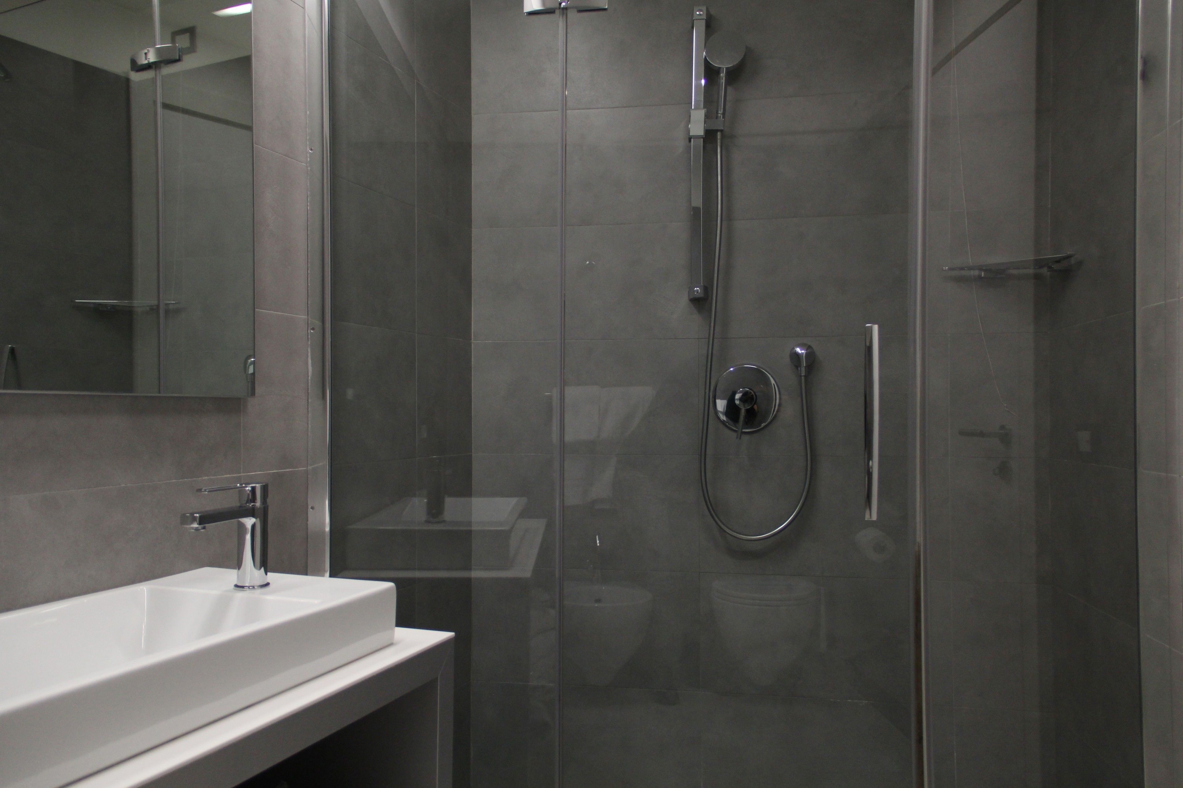 Shower, free toiletries, hair dryer, slippers