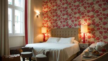Egyptian cotton sheets, down comforters, pillowtop beds, minibar