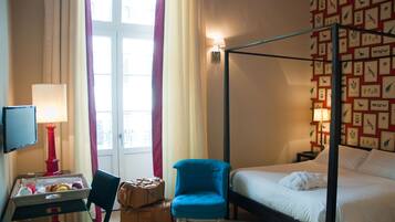 Egyptian cotton sheets, down comforters, pillowtop beds, minibar
