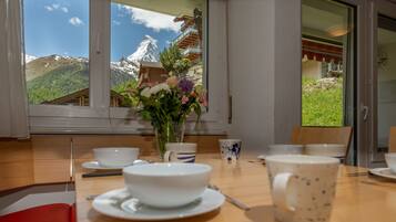 Apartment, 2 Bedrooms | Living area | 50-inch flat-screen TV with digital channels, TV