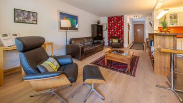 Apartment, 2 Bedrooms | Living area | 50-inch flat-screen TV with digital channels, TV