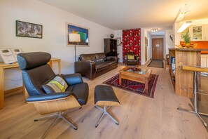 Apartment, 2 Bedrooms | Living area | 50-inch flat-screen TV with digital channels, TV