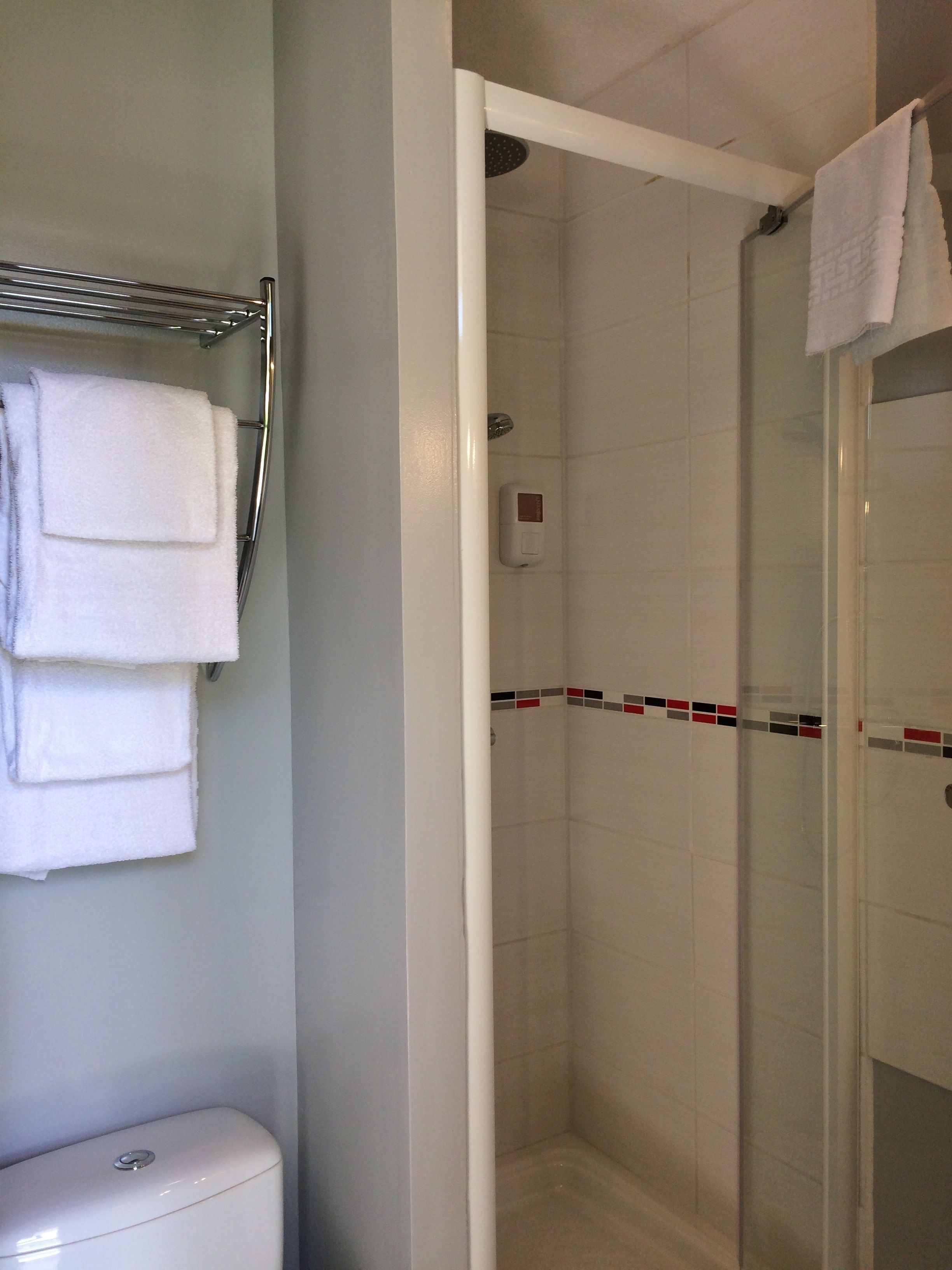 shower, free toiletries, hair dryer, towels