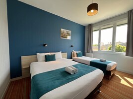 Desk, blackout drapes, free WiFi, bed sheets