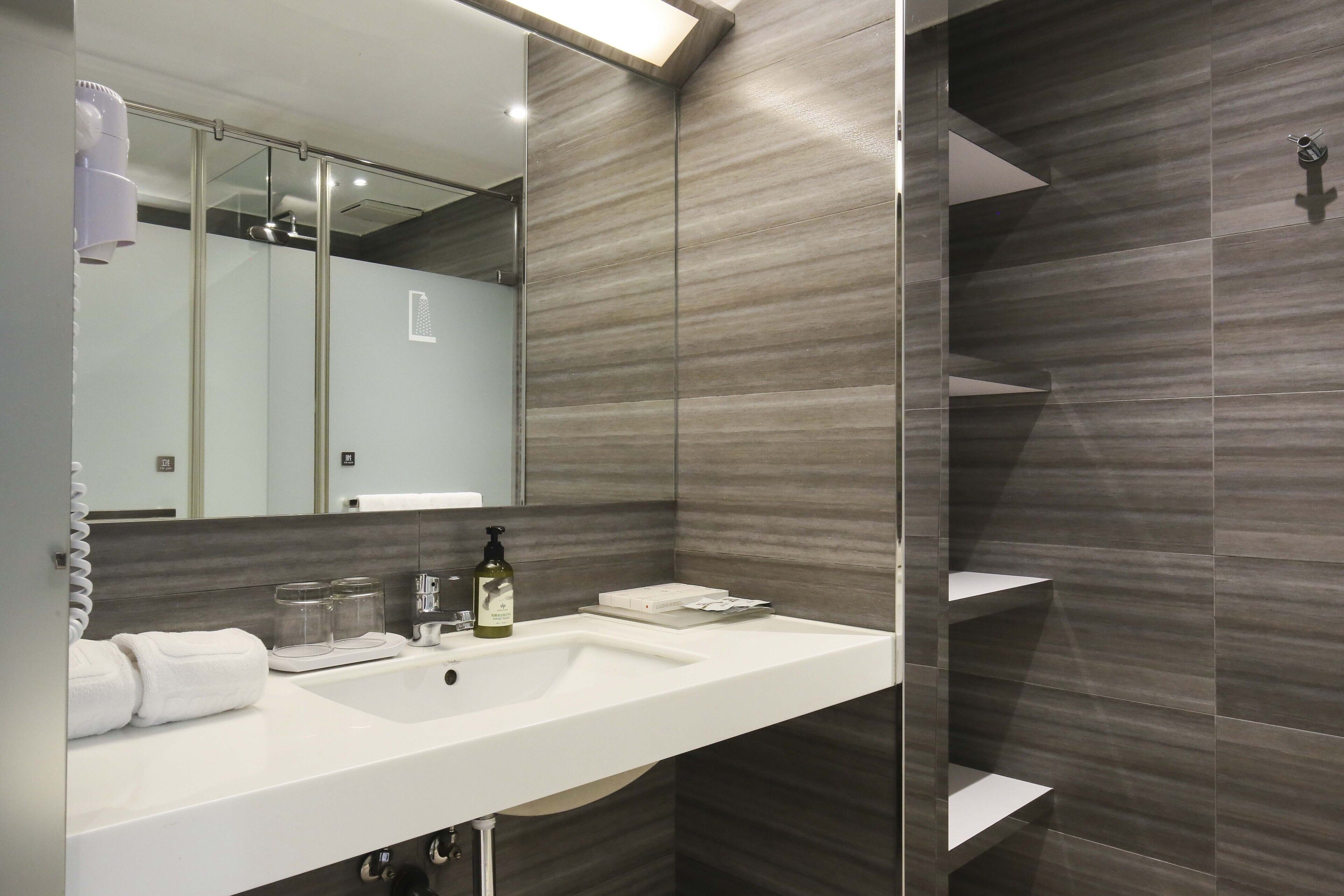 elite double room | bathroom | shower, rainfall showerhead, free toiletries, hair dryer