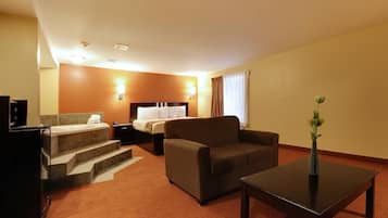 Suite, 1 King Bed with Sofa bed, Non Smoking, Jetted Tub | In-room safe, desk, blackout drapes, bed sheets