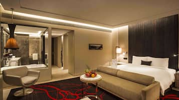 Habitación ejecutiva, 1 cama King size | Ropa de cama de alta calidad, edredón y minibar