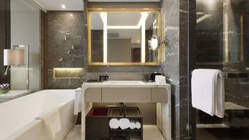Separate tub and shower, deep soaking tub, free toiletries, hair dryer