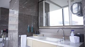 Premium bedding, down comforters, minibar, in-room safe