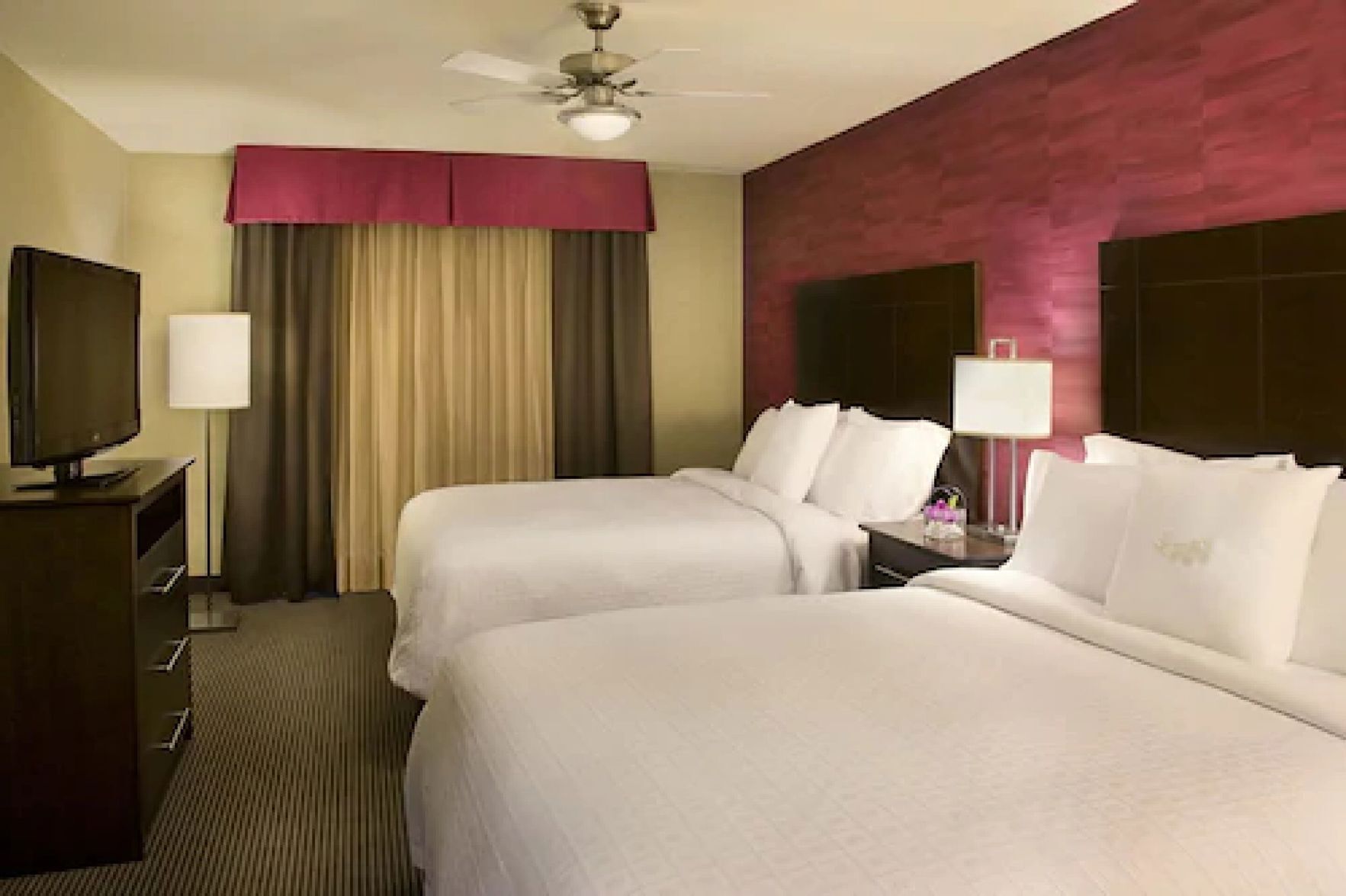 Hypo-allergenic bedding, down duvets, pillow-top beds, in-room safe