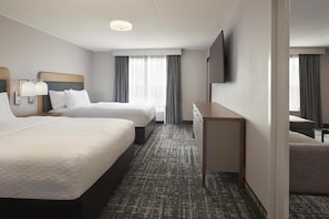 Hypo-allergenic bedding, down comforters, pillowtop beds, in-room safe