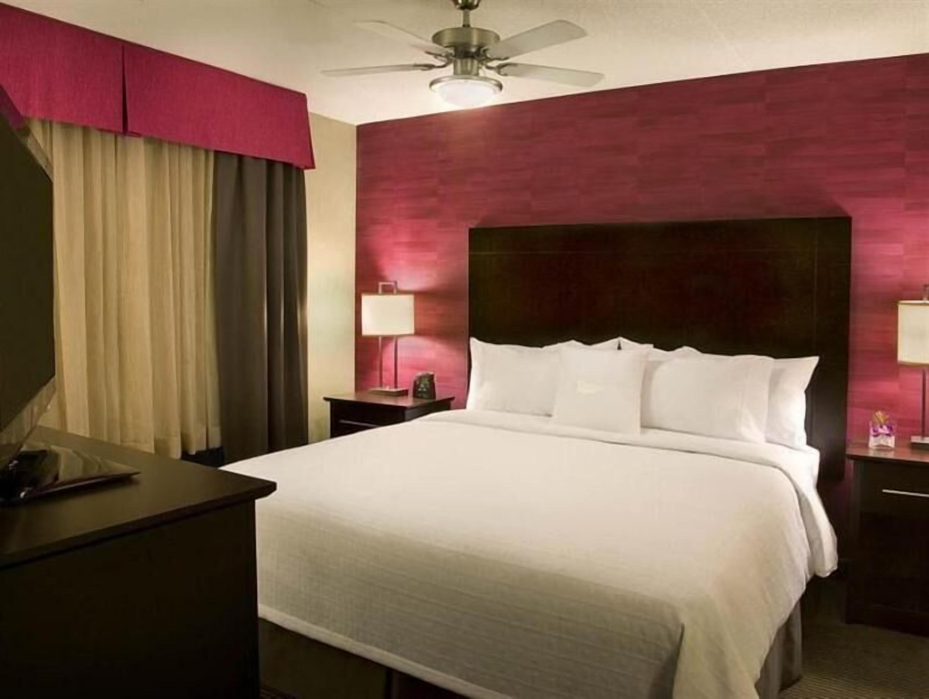 Hypo-allergenic bedding, down duvets, pillow-top beds, in-room safe