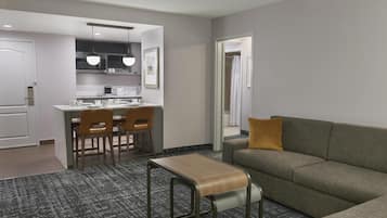 2 Bedroom Suite, One King and Two Queen Beds, Non Smoking | Living area | Flat-screen TV, MP3 dock