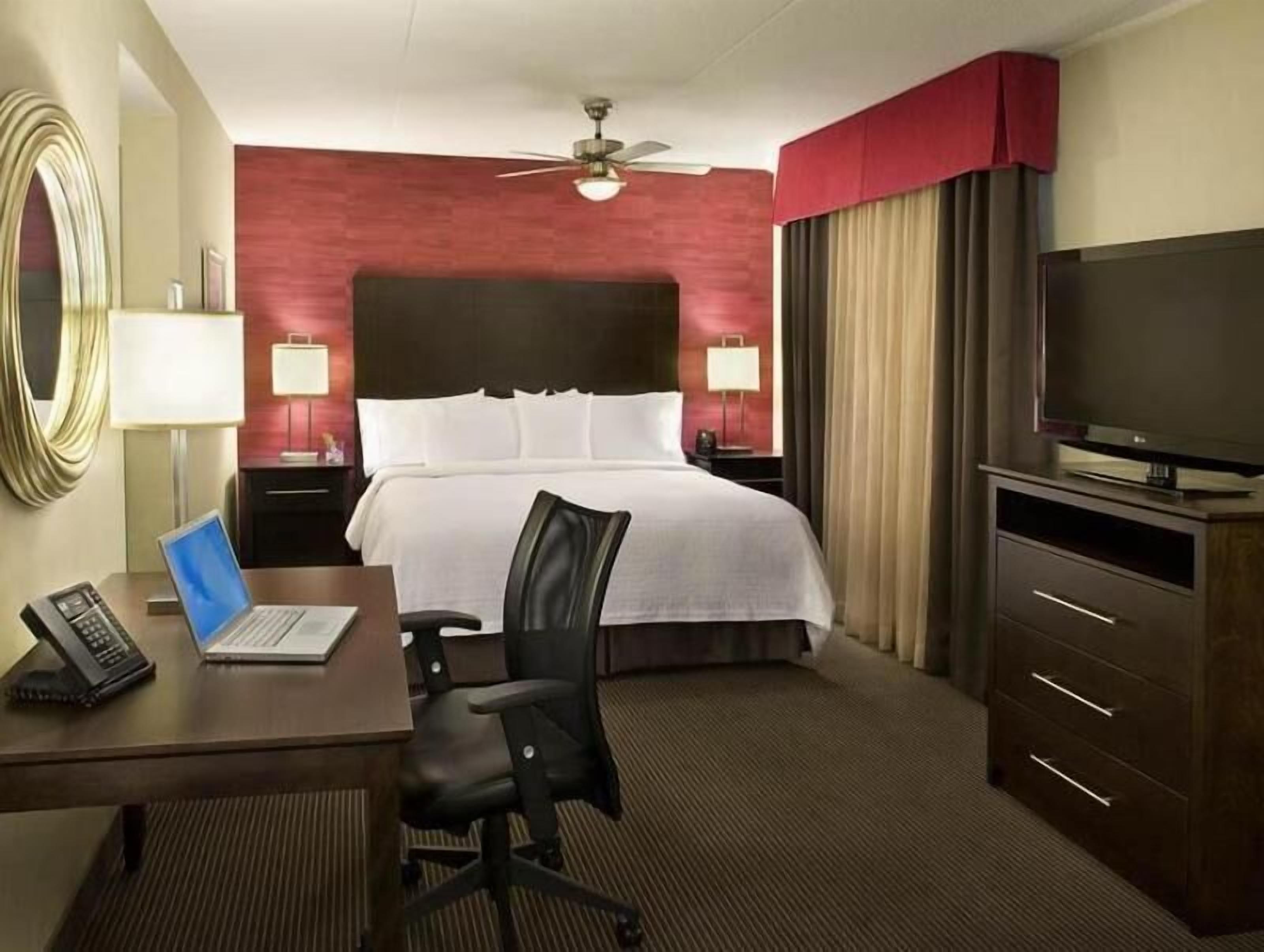 Hypo-allergenic bedding, down duvets, pillow-top beds, in-room safe