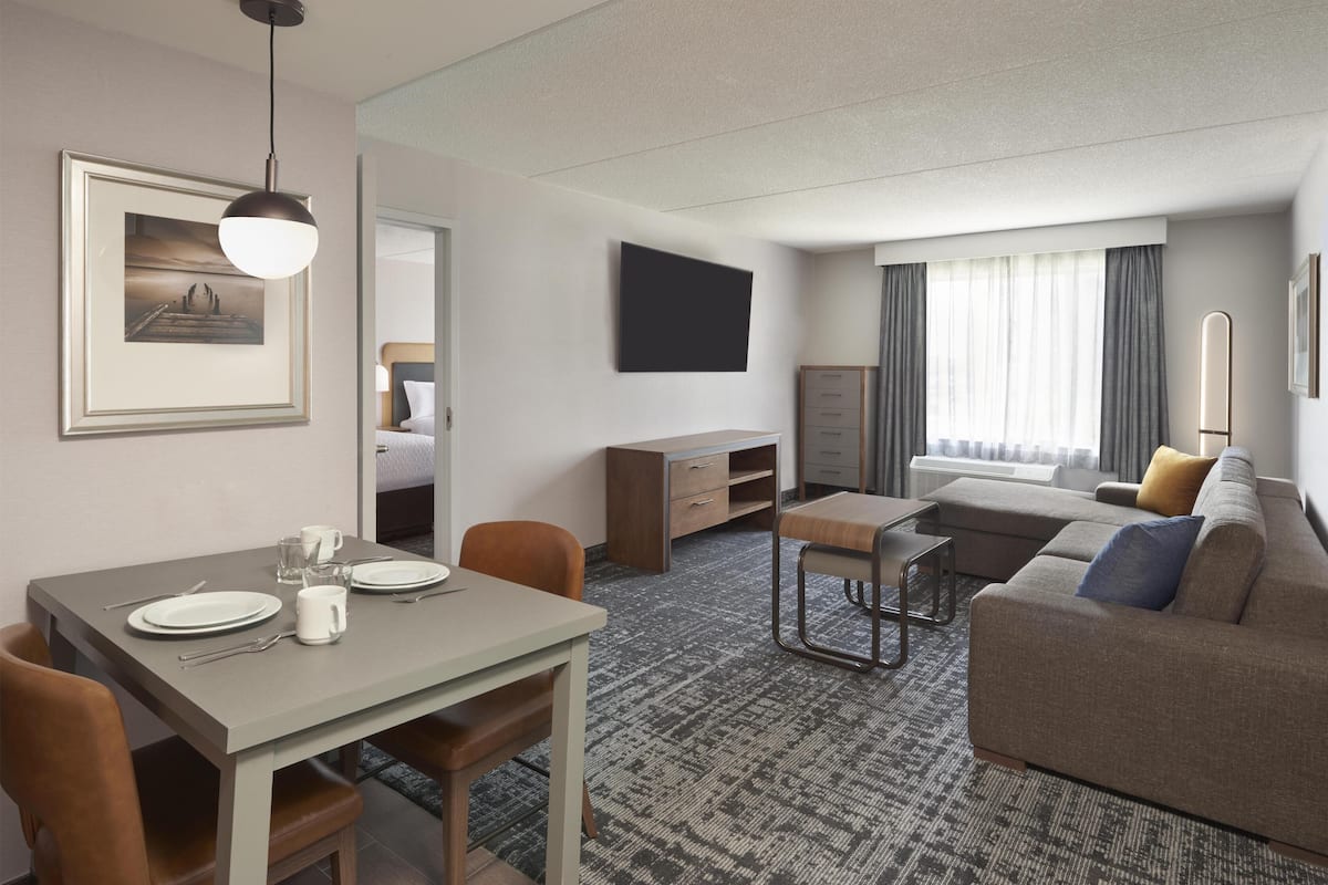 1 Bedroom Suite, Two Queen Beds and One Sofa Bed, Non Smoking | Living area | 55-inch flat-screen TV with cable channels