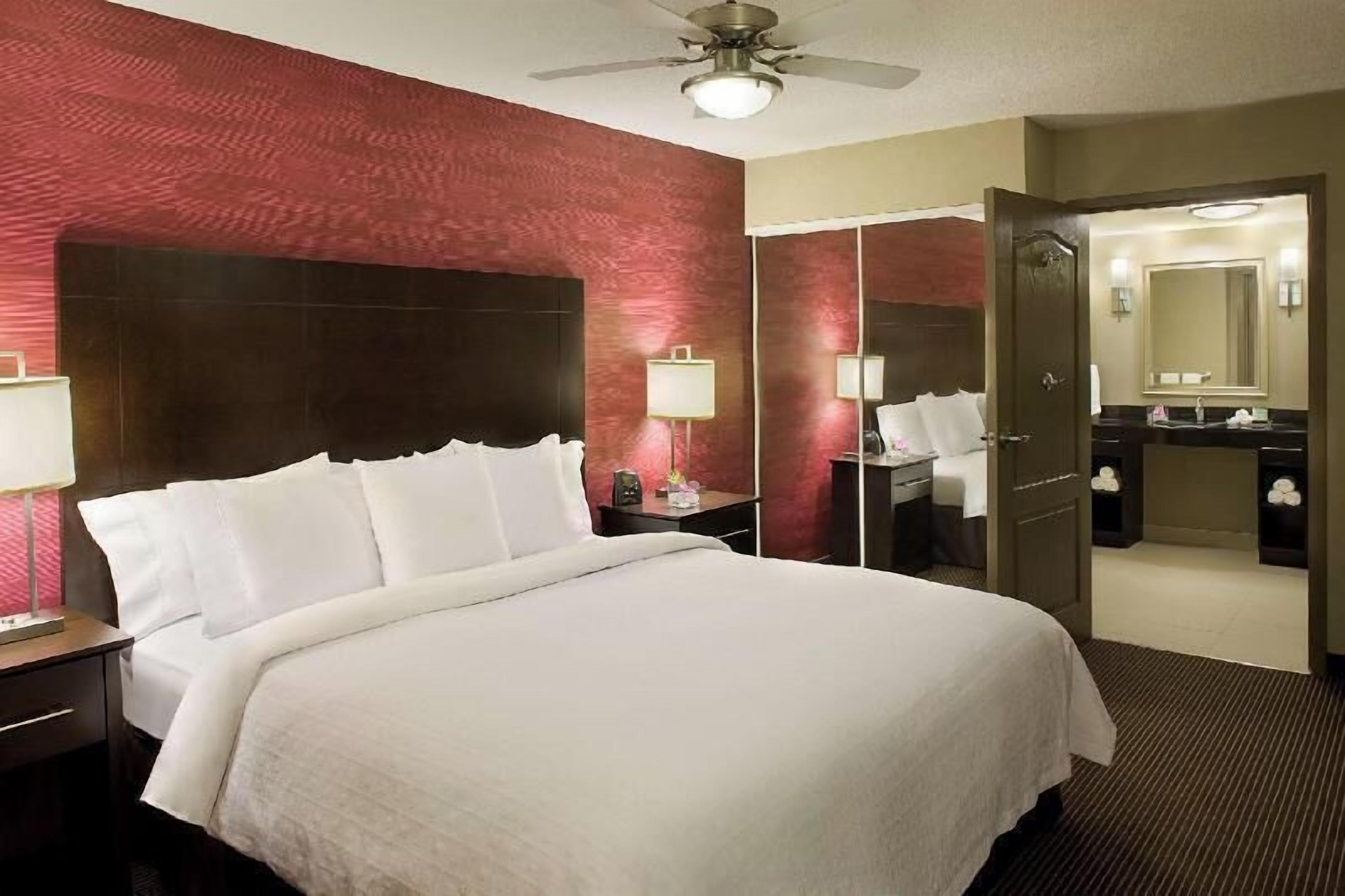 Hypo-allergenic bedding, down duvets, pillow-top beds, in-room safe