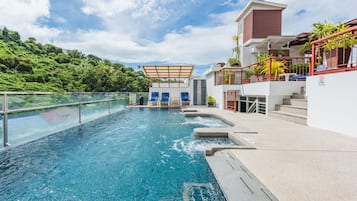 Outdoor pool, a rooftop pool, open 8:00 AM to 8:00 PM, free cabanas