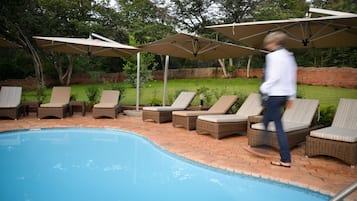 Outdoor pool, pool umbrellas, pool loungers