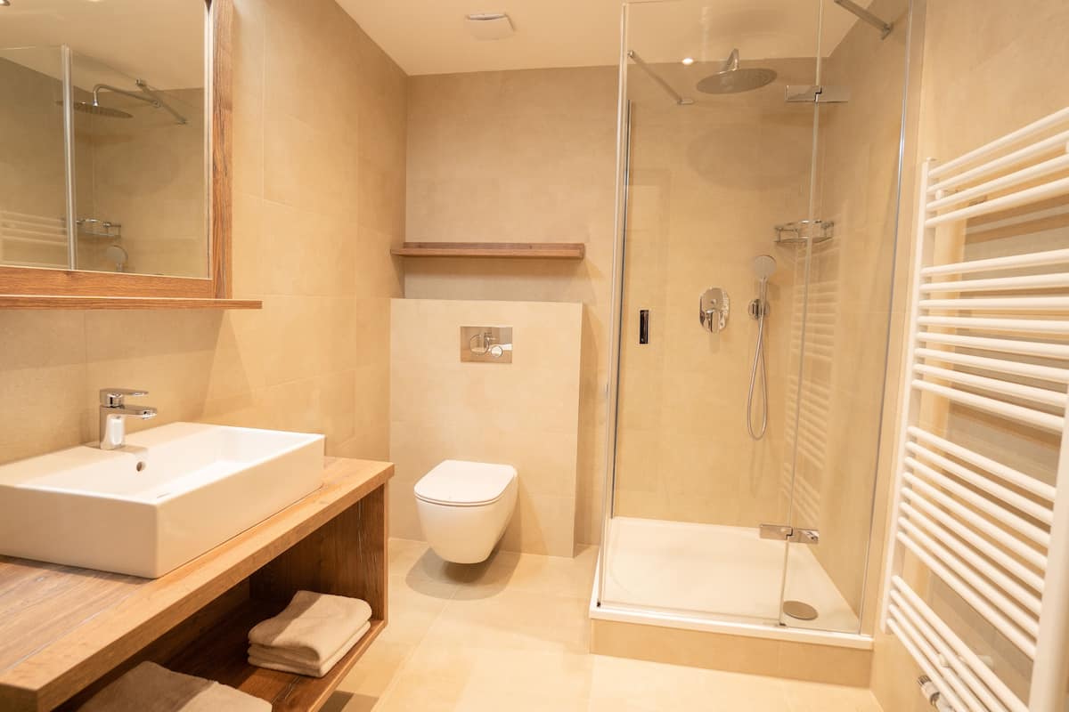 junior studio suite | bathroom | free toiletries, hair dryer, bathrobes, slippers