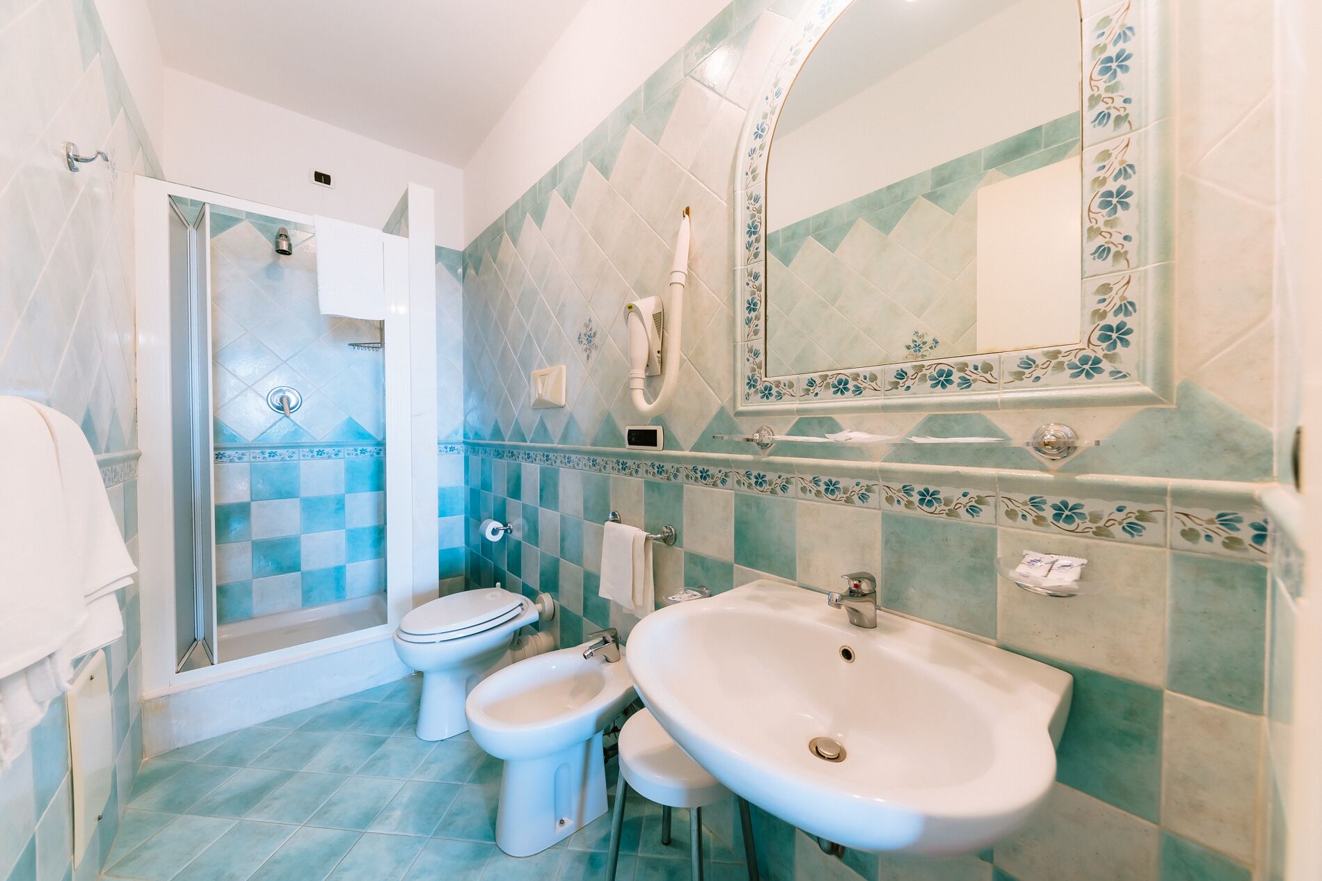 superior double room | bathroom | rainfall showerhead, hair dryer, bidet, towels