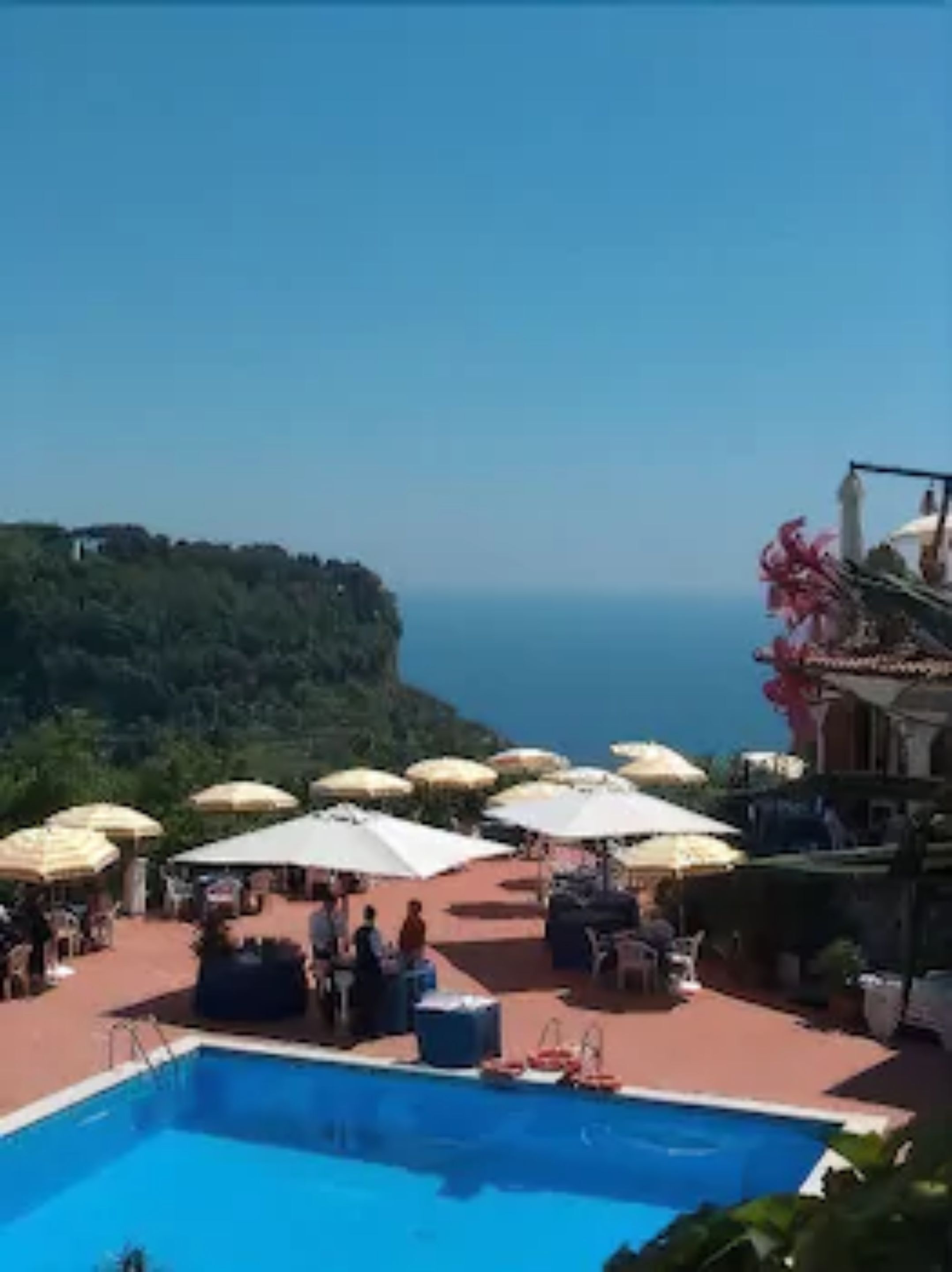 outdoor pool, pool umbrellas, pool loungers