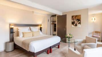 Habitación ejecutiva, 1 cama Queen size, para no fumadores (Twin bed on request) | Camas con efecto memoria y caja de seguridad en la habitación