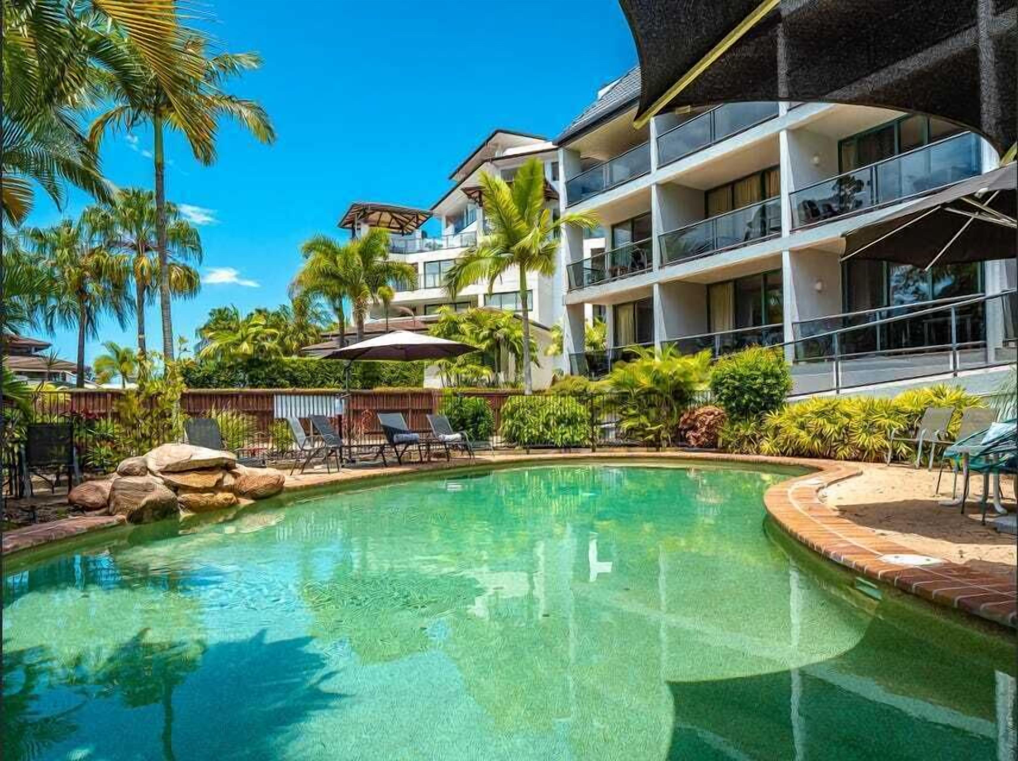 Outdoor pool, open 7:00 AM to 8:00 PM, pool umbrellas, pool loungers