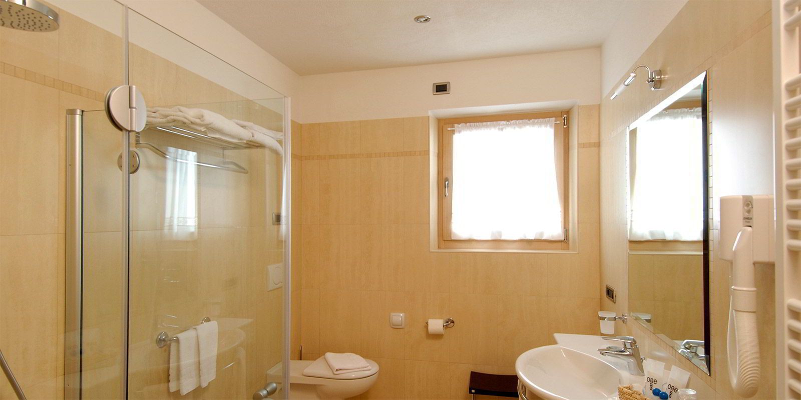 superior double room | bathroom | shower, hair dryer, towels