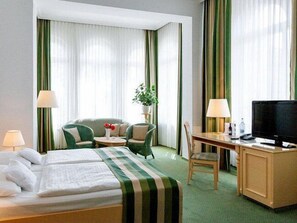 Select Comfort beds, minibar, in-room safe, desk