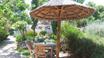Suite, 2 Bedrooms, Kitchen | Outdoor dining | Lunch, dinner served; French cuisine, beach views