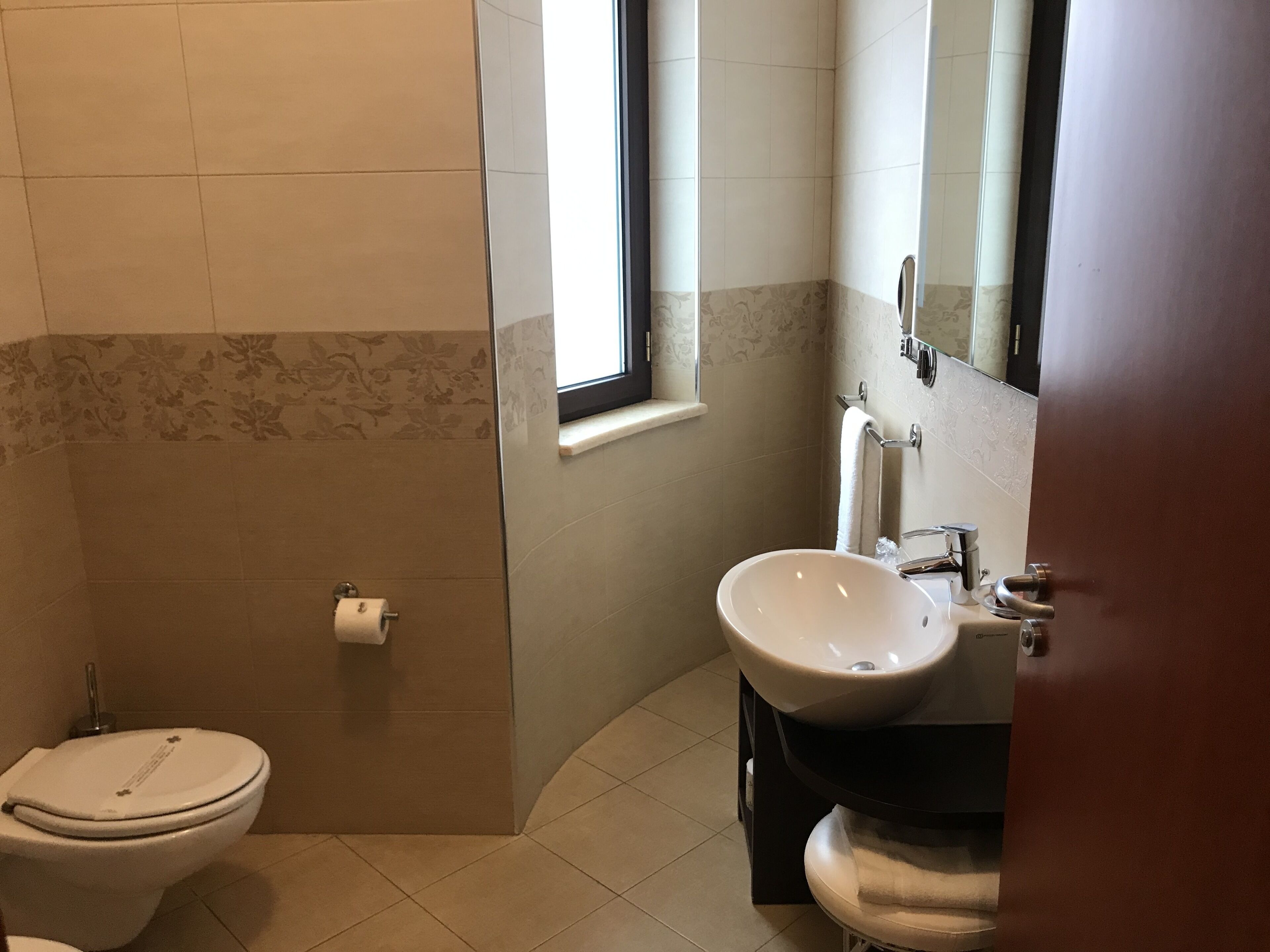 junior studio suite | bathroom | shower, designer toiletries, hair dryer, bidet