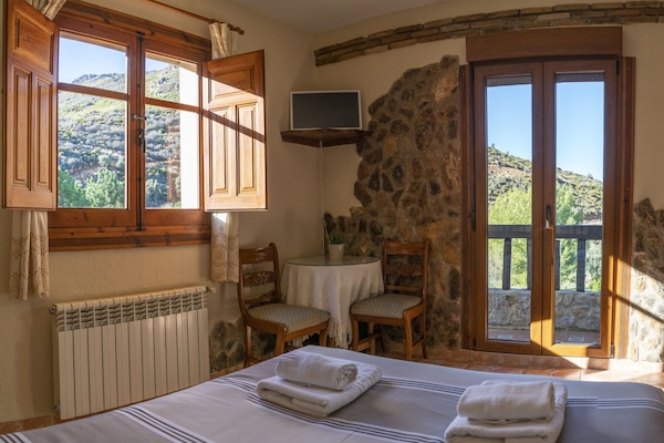 Traditional Double Room, 1 Bedroom, Private Bathroom, Mountain View | 1 bedroom, down comforters, individually decorated, bed sheets