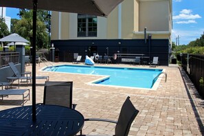 Outdoor pool, pool umbrellas, sun loungers