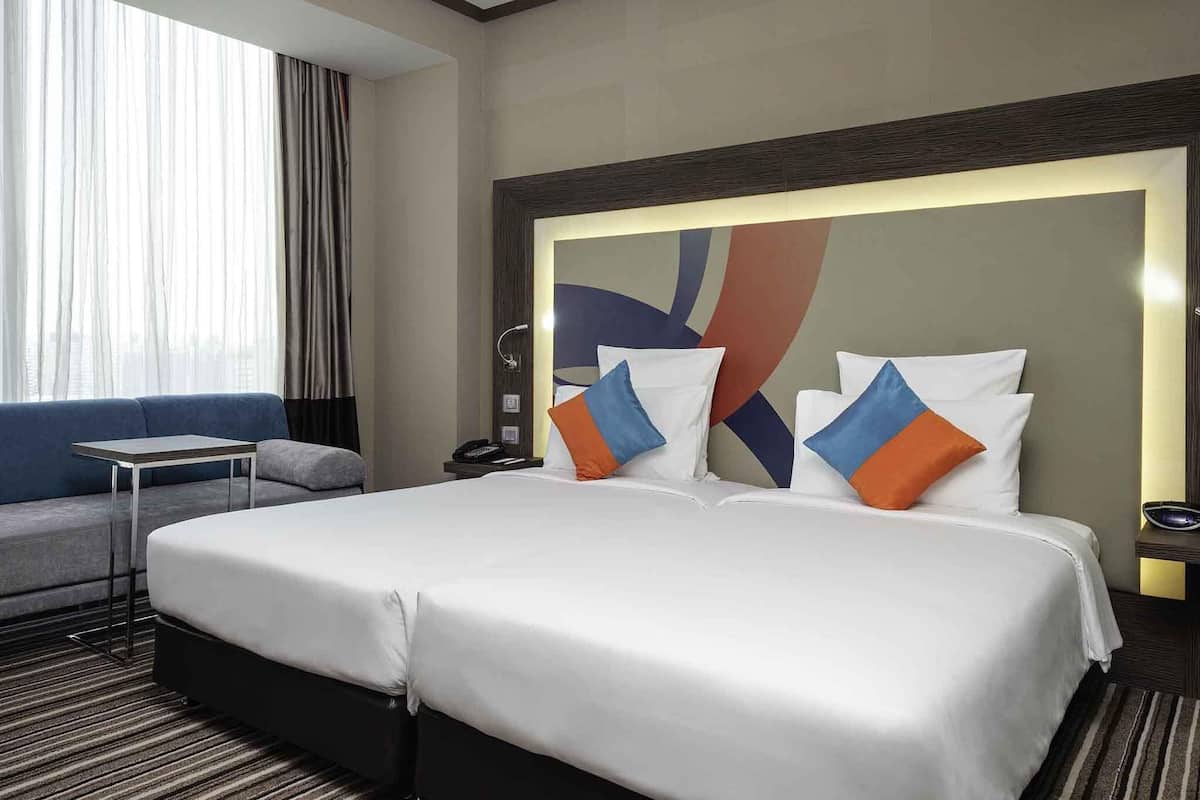 Chambre Exécutive avec lits jumeaux, 2 lits une place | Minibar, coffres-forts dans les chambres, décoration personnalisée