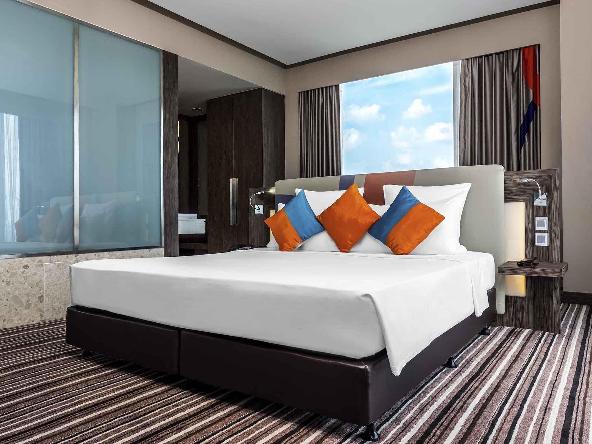 Premier Suite, 1 King Bed | Minibar, in-room safe, individually decorated, individually furnished