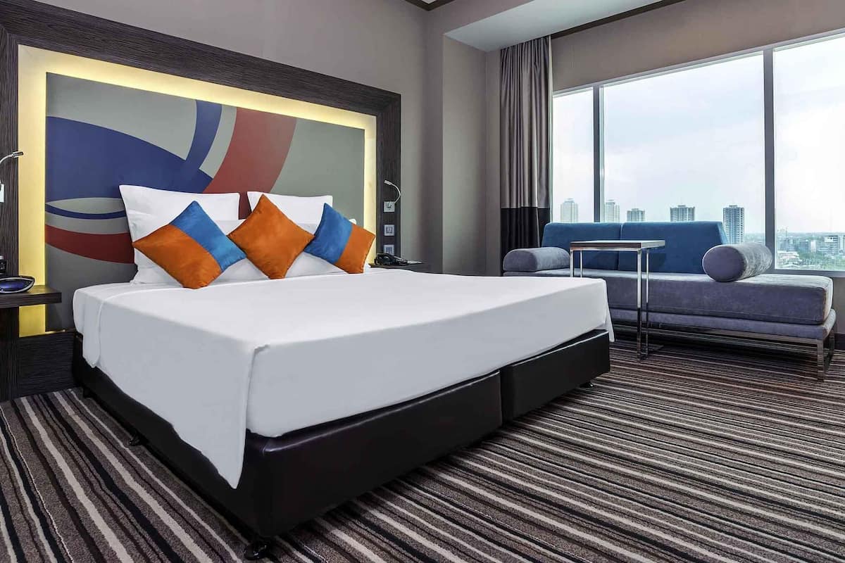 Quarto executivo, 1 cama de casal | Frigobar, cofres nos quartos, individualmente decorados