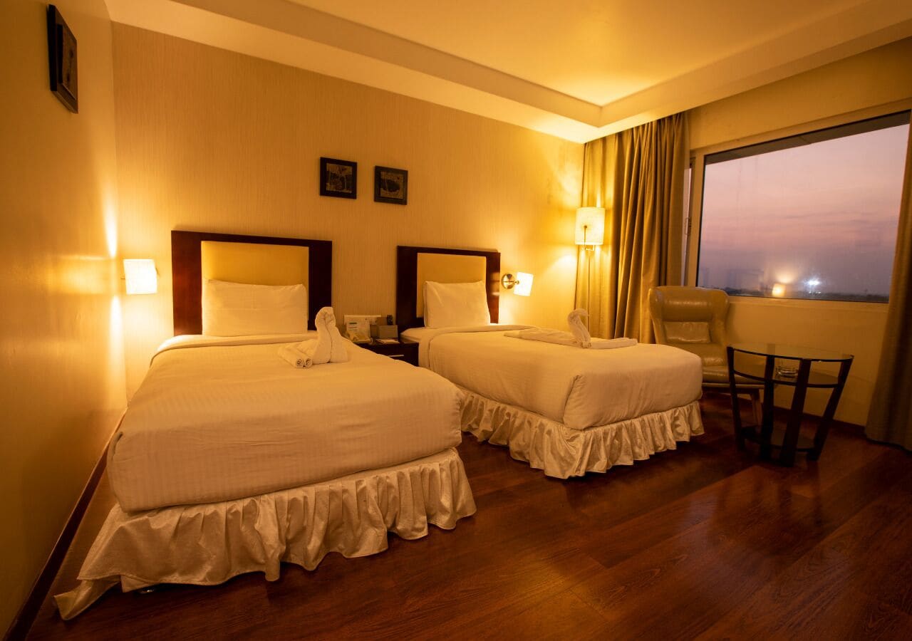 Executive Room | Pillowtop beds, minibar, in-room safe, laptop workspace