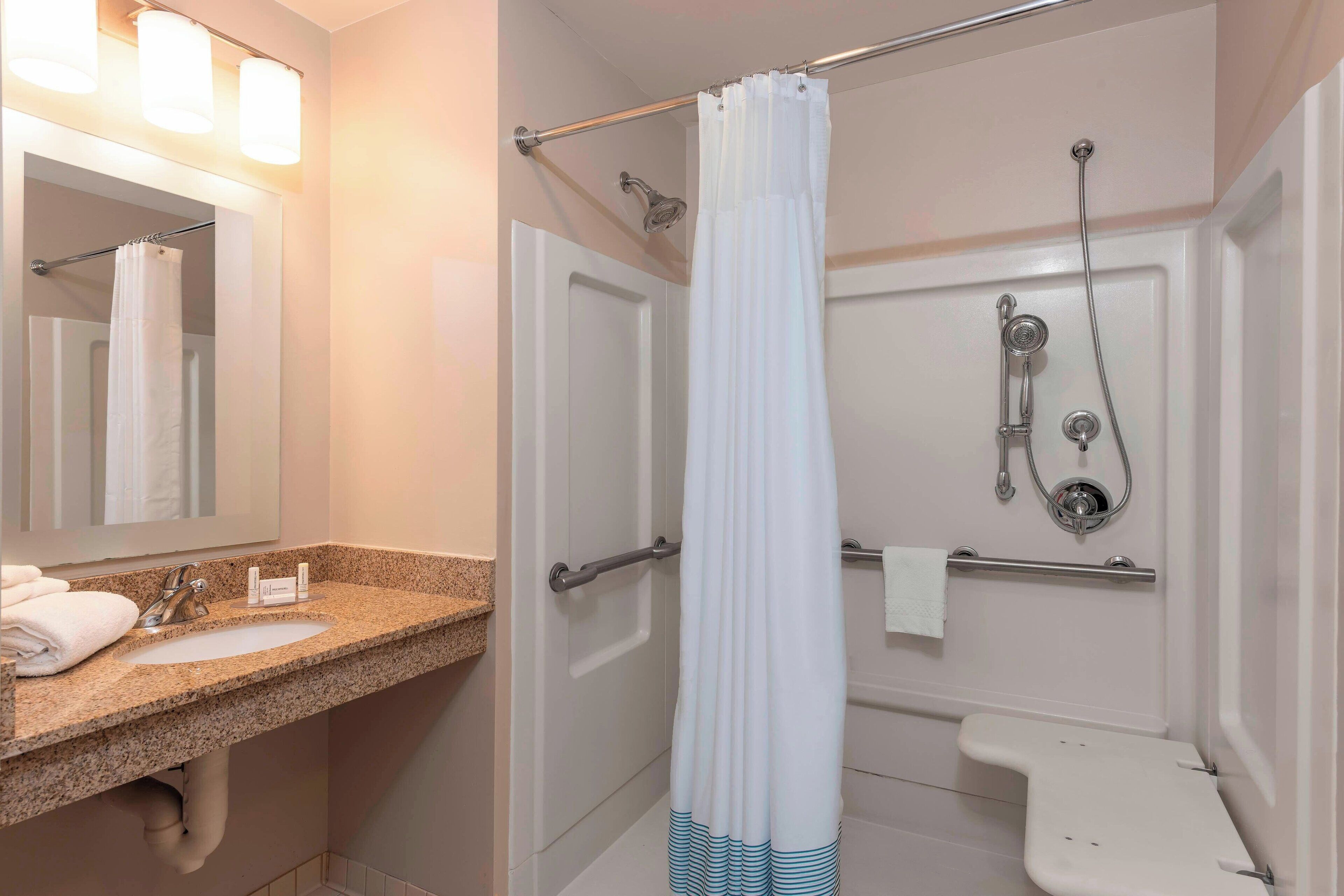 combined shower/bathtub, free toiletries, hair dryer, towels