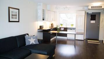 Standard Studio (Main building) | Living area | Flat-screen TV