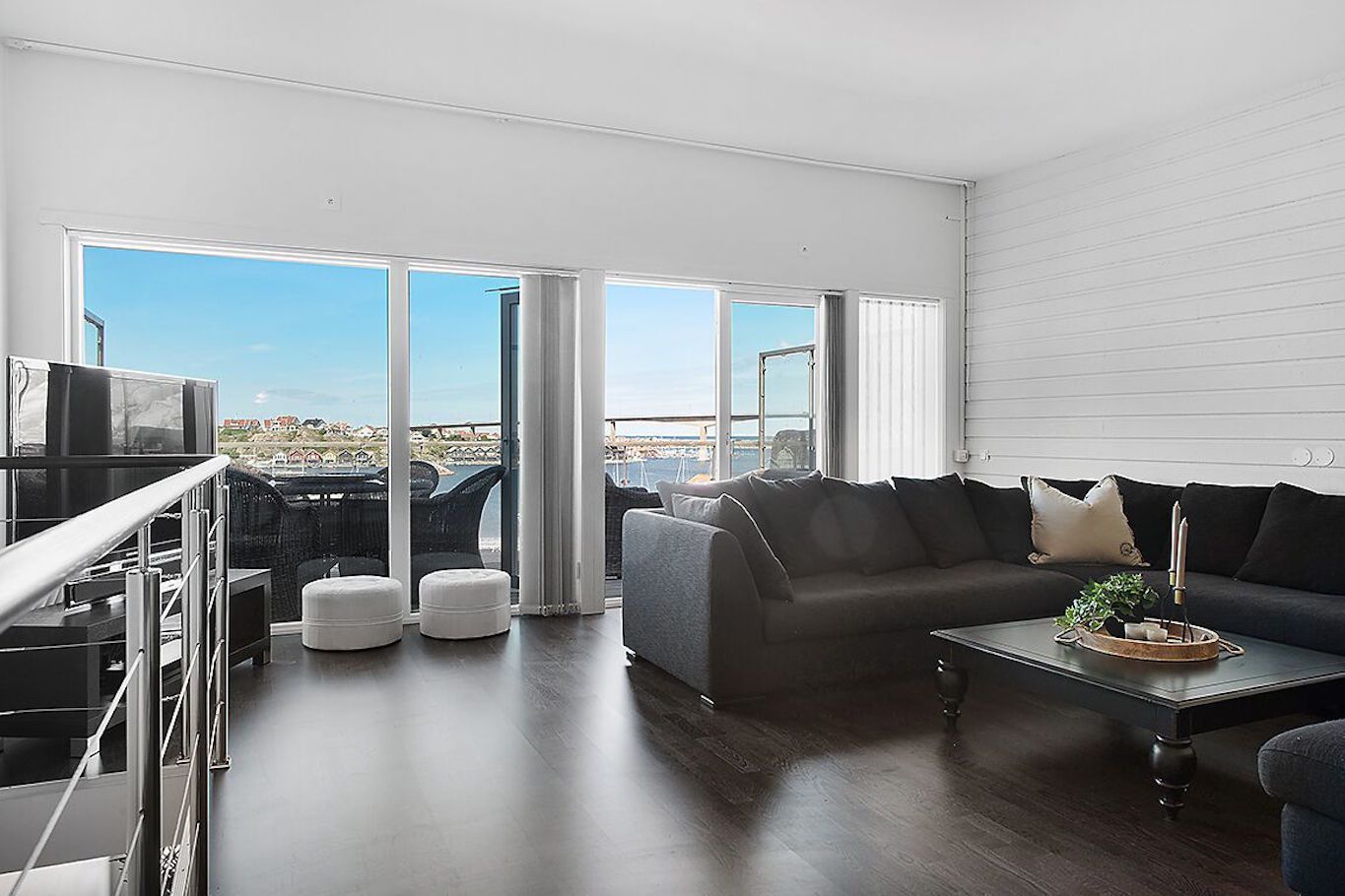 Exclusive Condo, 2 Bedrooms | Living room | Flat-screen TV